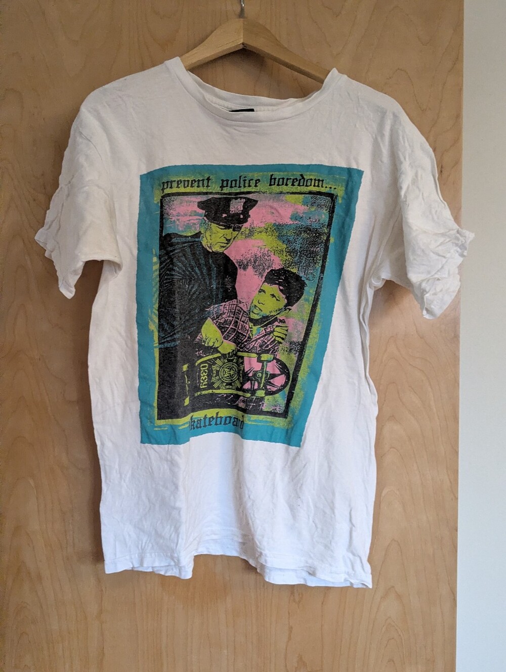 Skate Tee  Of Shepard Fairey's 1989 Screen print Reproduction